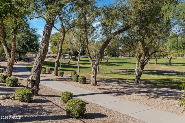 a view of house with yard