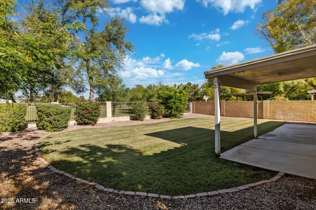 a view of pool and outdoor space