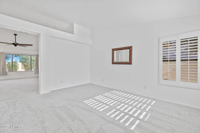 a view of a house with a yard and garage