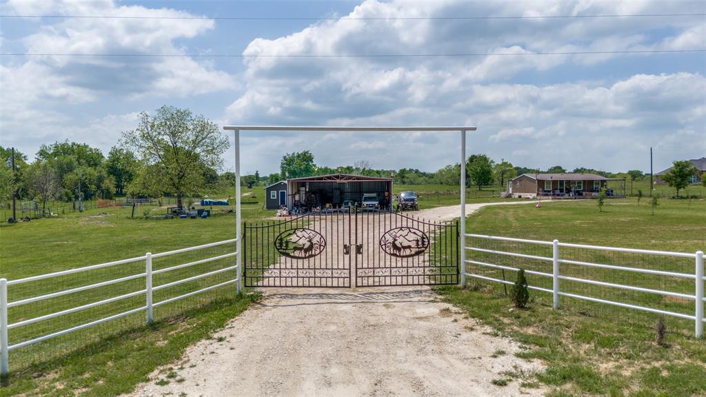 266 Fcr 1031 Wortham, TX 76693 - Photo 4 of 10 Gate featuring a fenced front yard