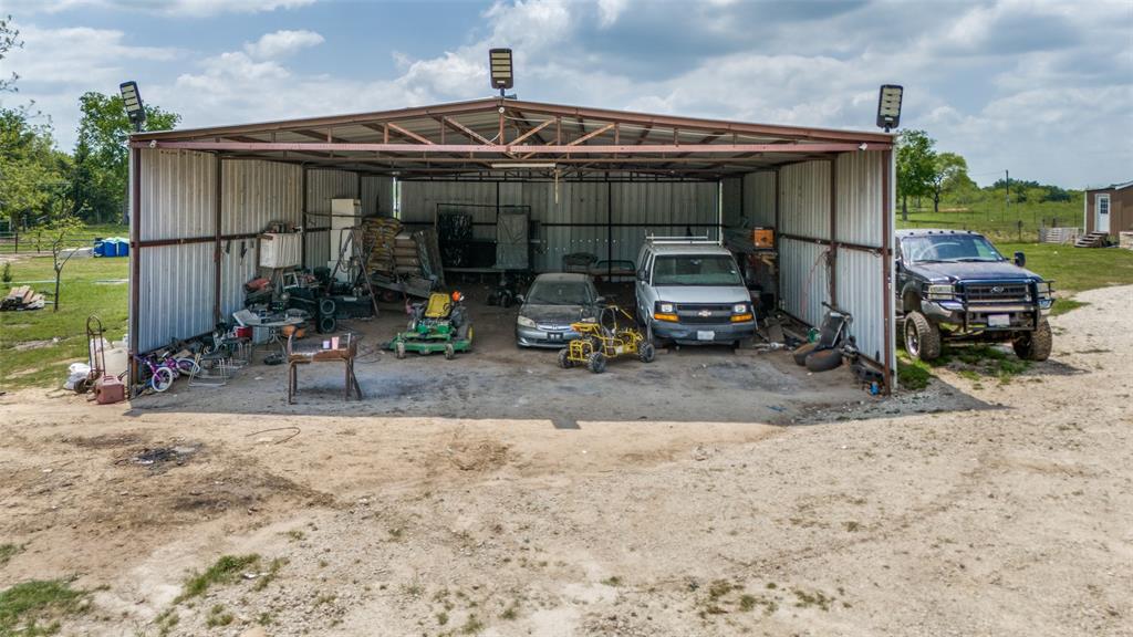 266 Fcr 1031 Wortham, TX 76693 - Photo 5 of 10 View of pole building with a detached carport