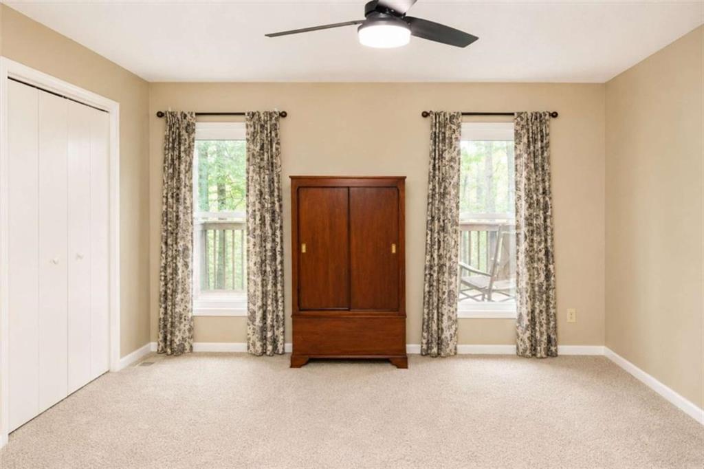365 River Ridge Trail Oxford, GA 30054 - Photo 14 of 37 an empty room with windows and closet