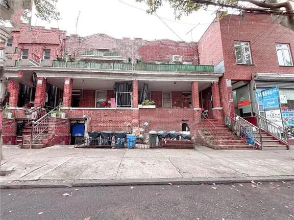 a front view of a building with street view