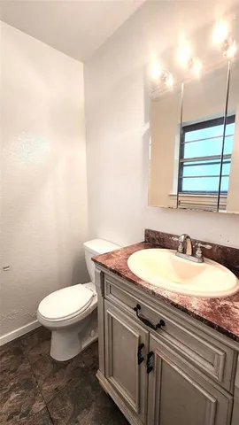 a view of a storage & utility room with a sink