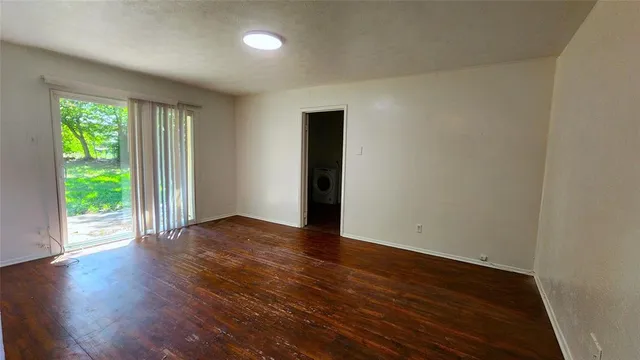 a kitchen with stainless steel appliances a refrigerator and a stove