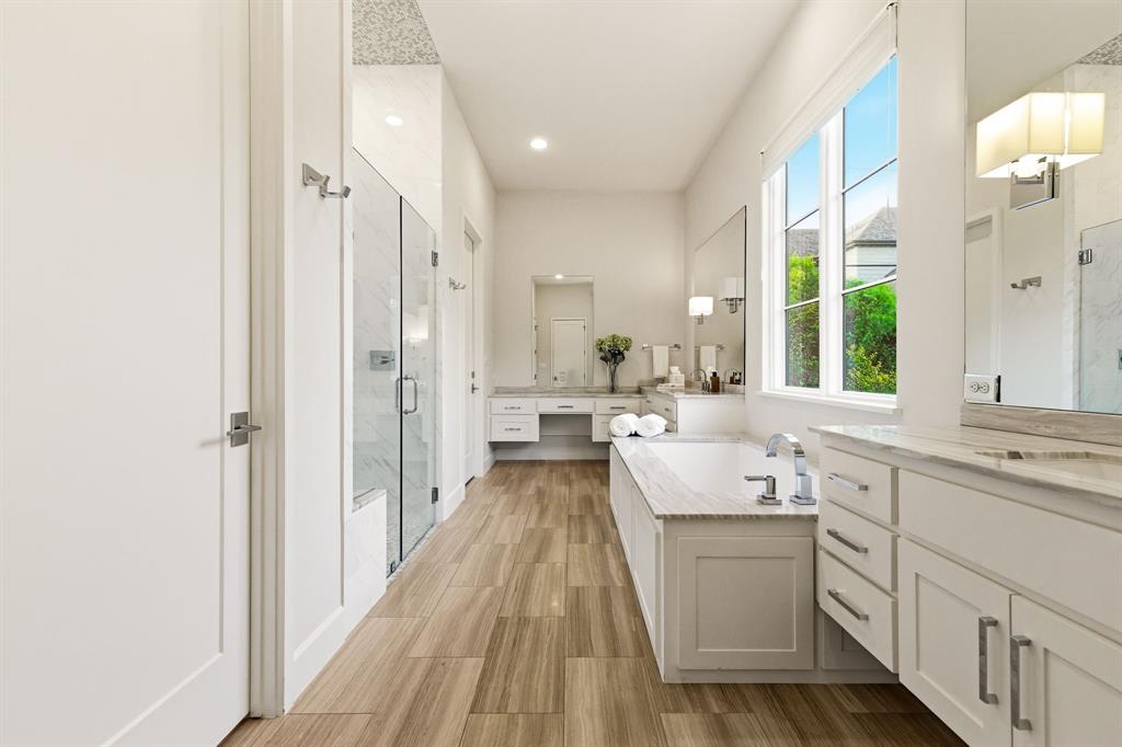 6523 Northwood Road Dallas, TX 75225 - Photo 20 of 36 a view of a kitchen with a sink and wooden floor