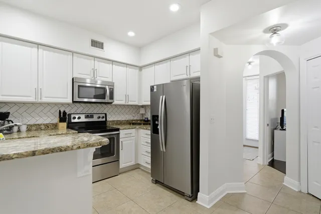 a view of livingroom with furniture and tv