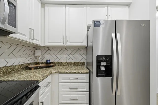 a bathroom with a toilet a sink and bathtub