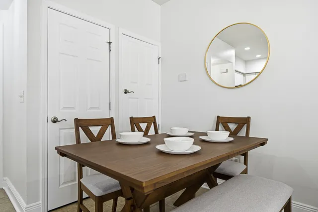 a view of a house with backyard and garden