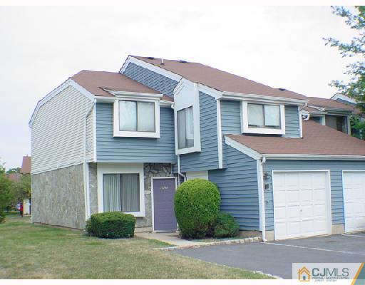 6201 Hana Road Edison, NJ 08817 - Photo 1 of 8 a view of a house with a yard