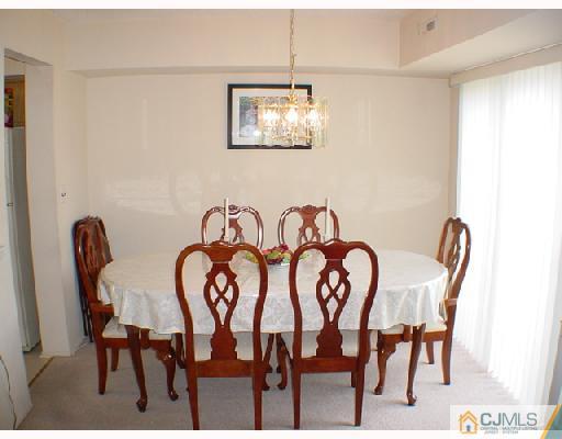 6201 Hana Road Edison, NJ 08817 - Photo 3 of 8 a dining room with furniture and window