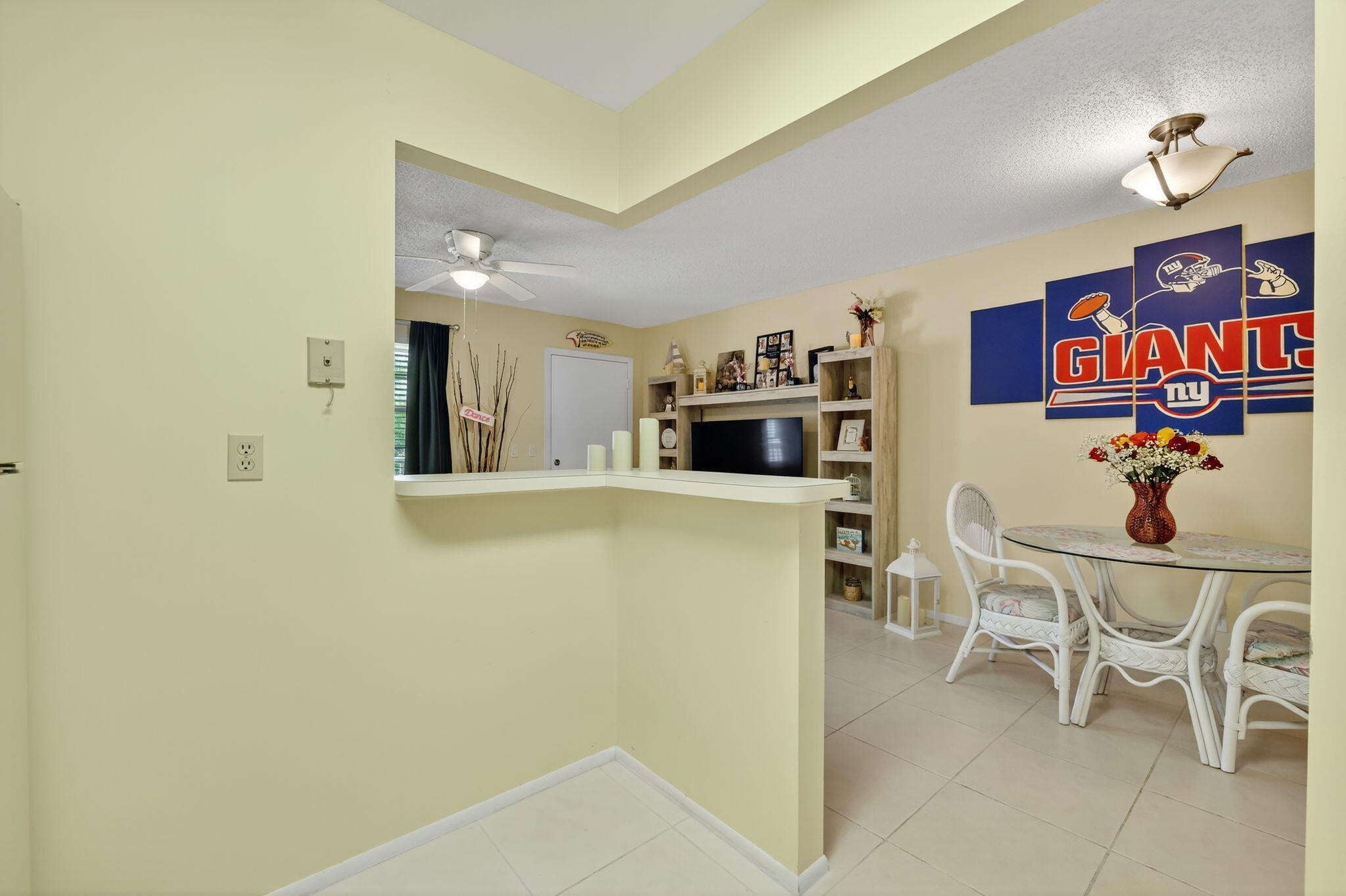 23 Lake Vista Trail, Unit 204 Port St. Lucie, FL 34952 - Photo 13 of 35 a view of a dining room with furniture and a kitchen