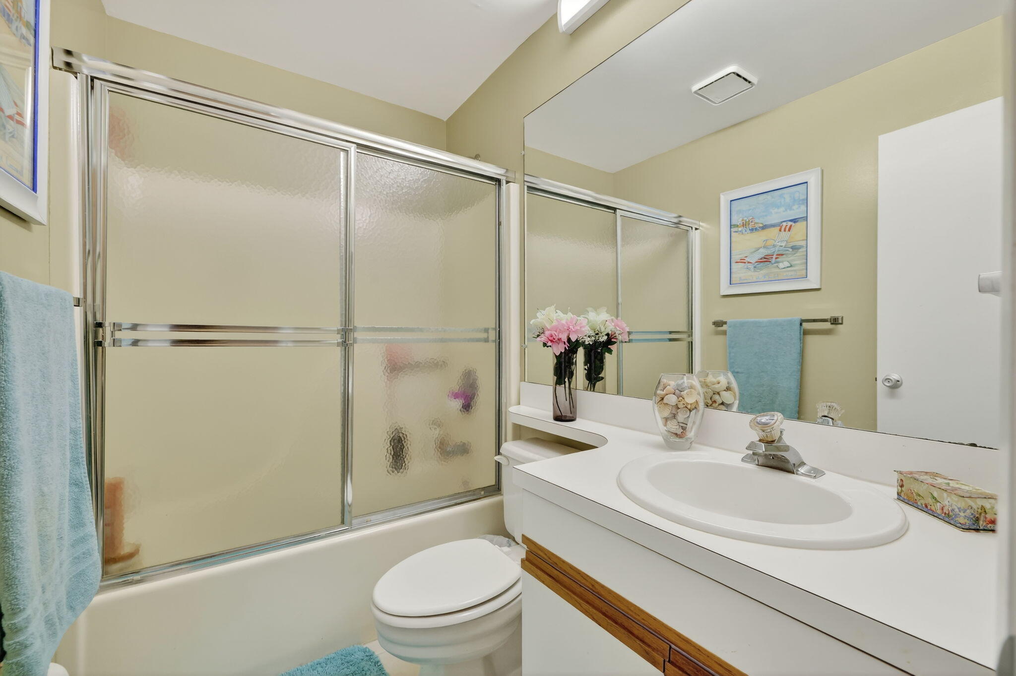 23 Lake Vista Trail, Unit 204 Port St. Lucie, FL 34952 - Photo 19 of 35 a bathroom with a sink toilet and shower