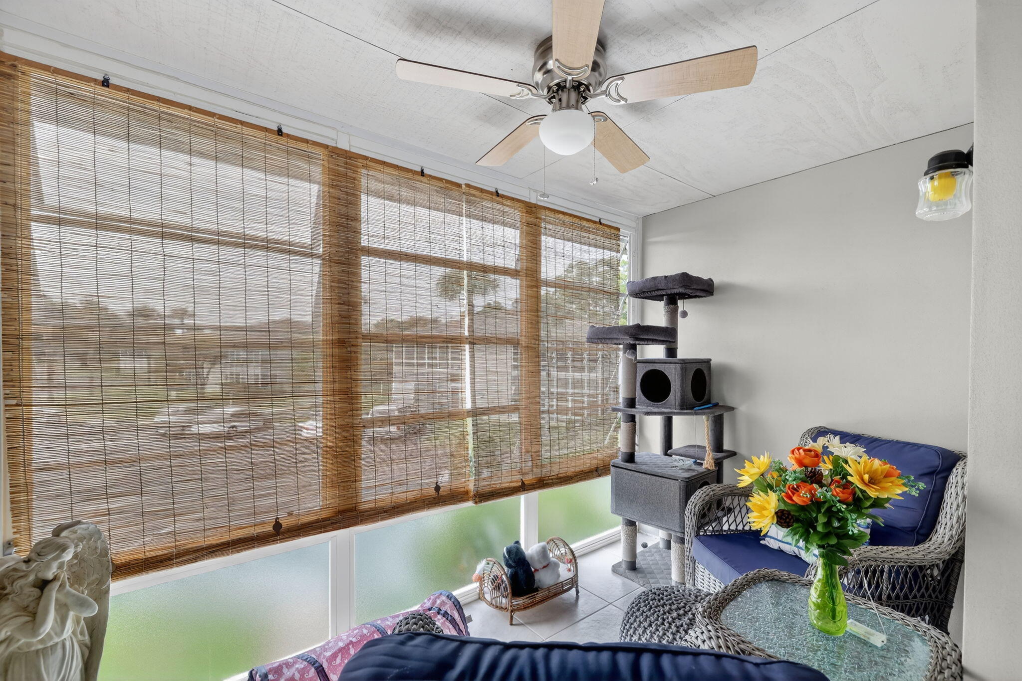 23 Lake Vista Trail, Unit 204 Port St. Lucie, FL 34952 - Photo 21 of 35 a living room with furniture and a table