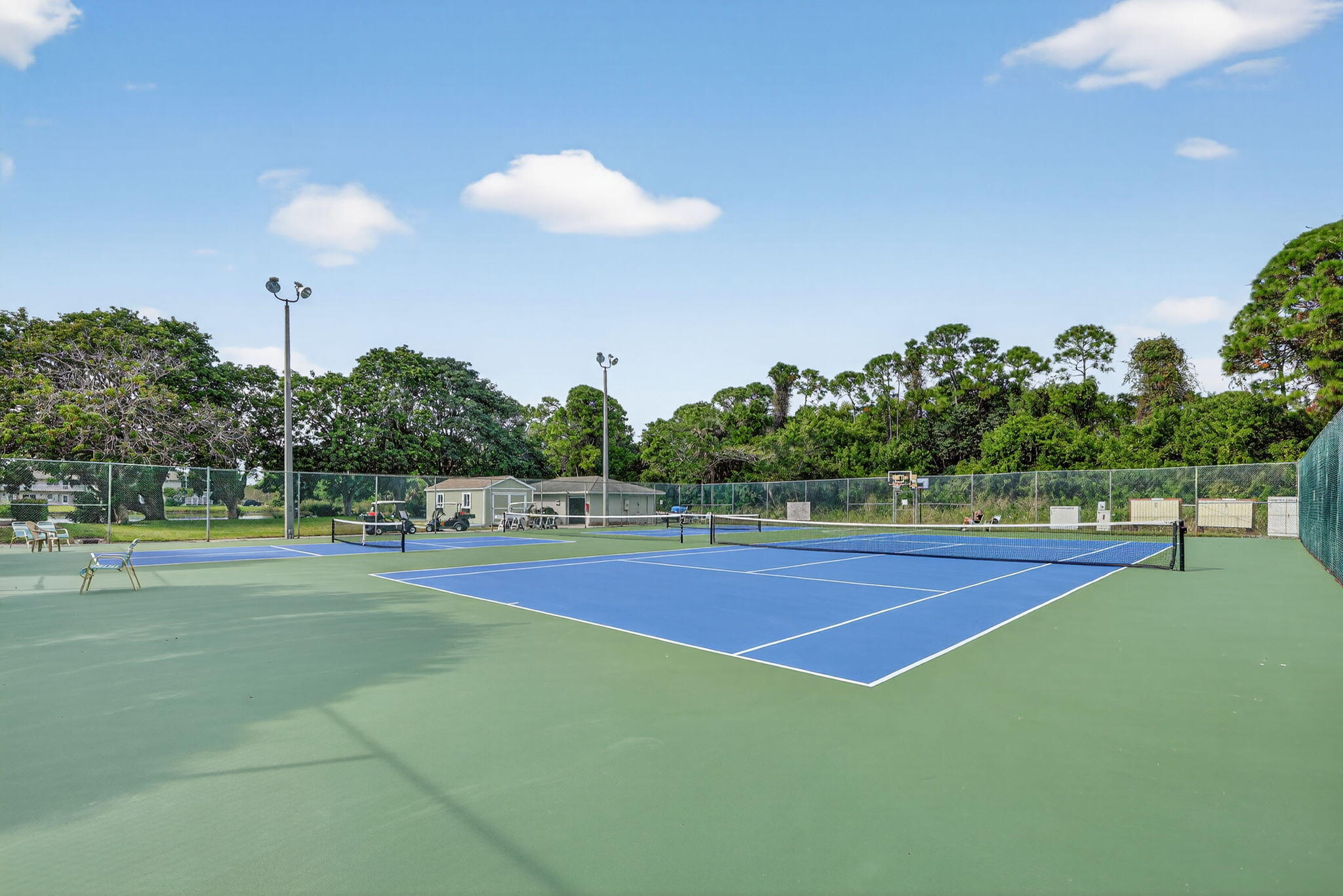 23 Lake Vista Trail, Unit 204 Port St. Lucie, FL 34952 - Photo 26 of 35 a view of a tennis court