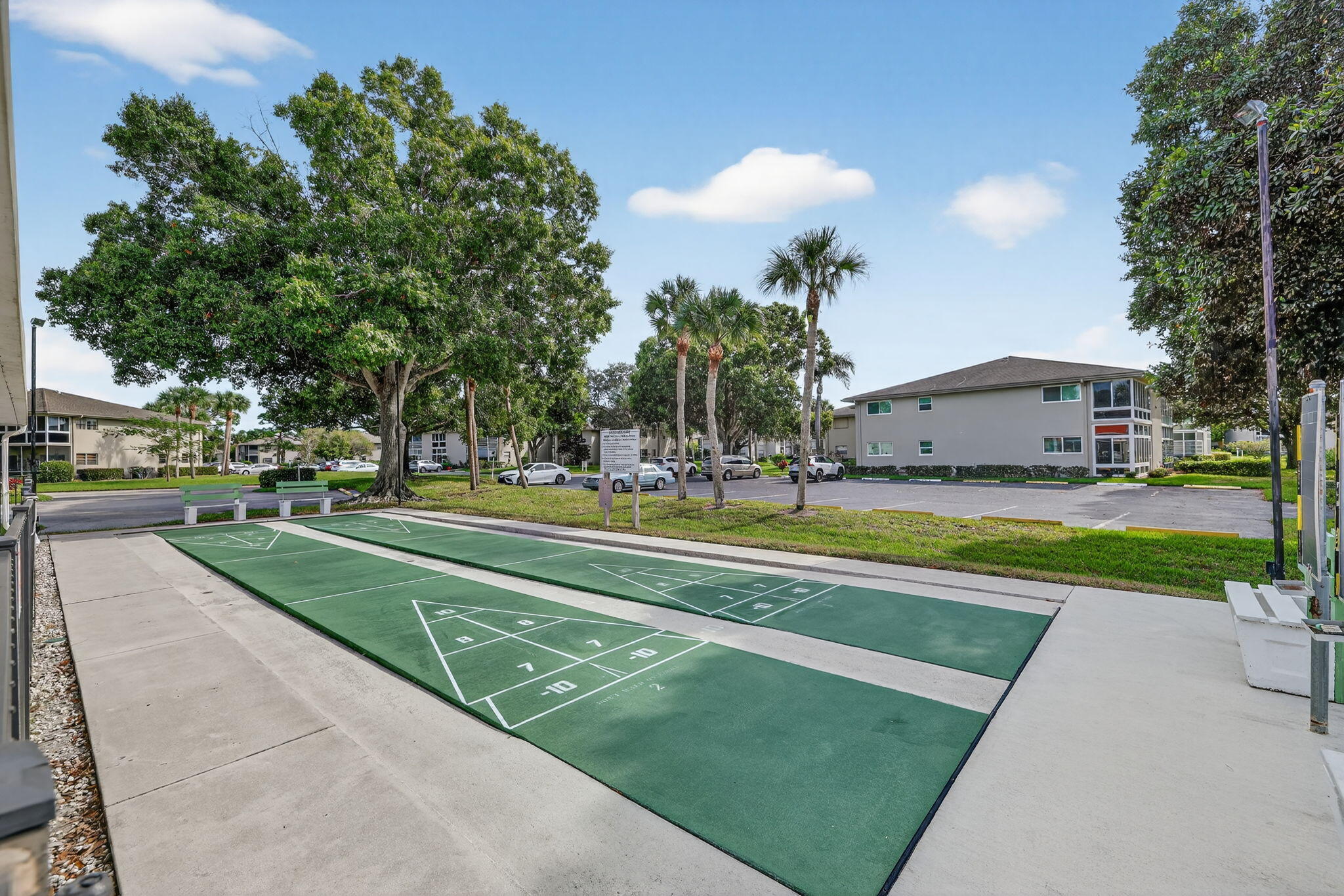 23 Lake Vista Trail, Unit 204 Port St. Lucie, FL 34952 - Photo 27 of 35 a view of the swimming pool and a yard