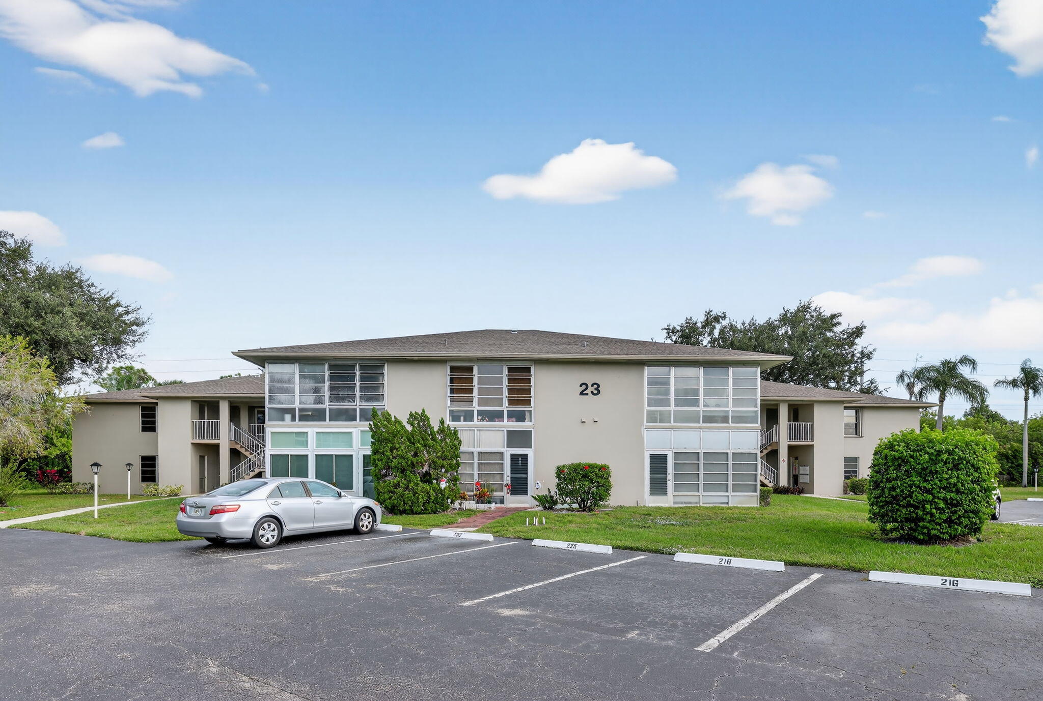 23 Lake Vista Trail, Unit 204 Port St. Lucie, FL 34952 - Photo 35 of 35 a view of street with parked cars