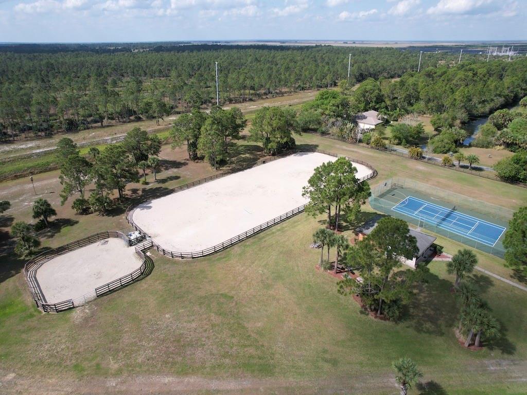 212 Deer Run Road Palm Bay, FL 32909 - Photo 13 of 15 an aerial view of a house with a yard and lake view