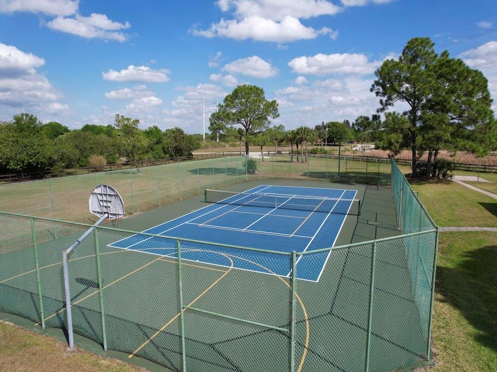 212 Deer Run Road Palm Bay, FL 32909 - Photo 15 of 15 a view of a tennis court