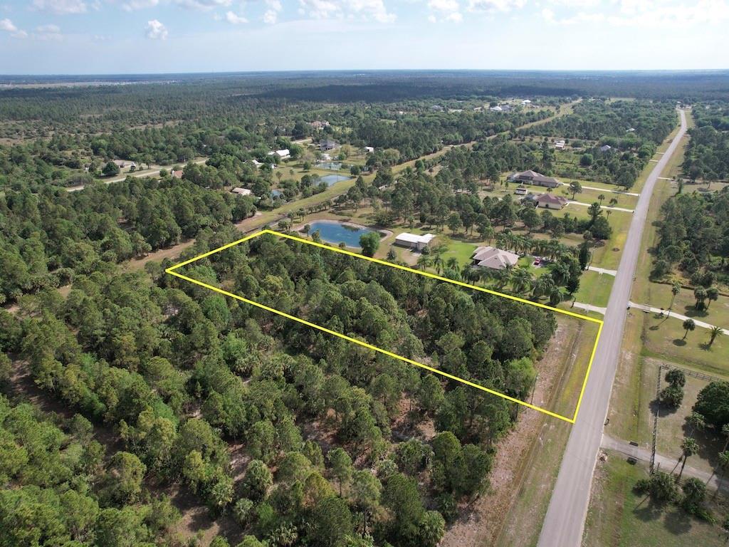 212 Deer Run Road Palm Bay, FL 32909 - Photo 3 of 15 an aerial view of multiple house