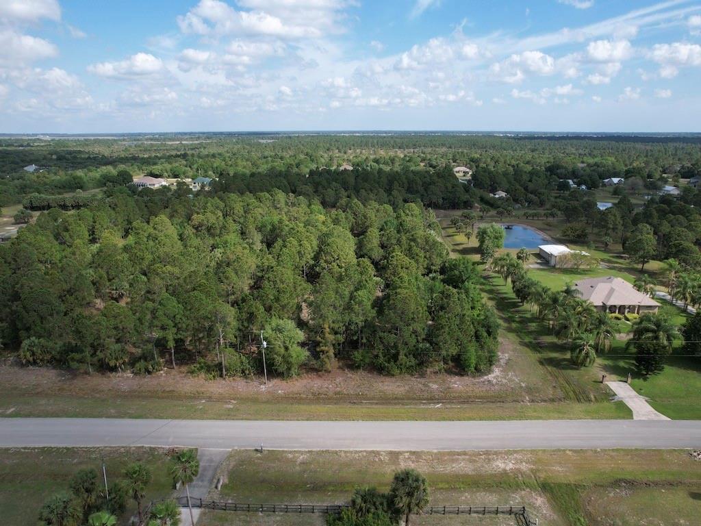 212 Deer Run Road Palm Bay, FL 32909 - Photo 8 of 15 a view of a lake with a city