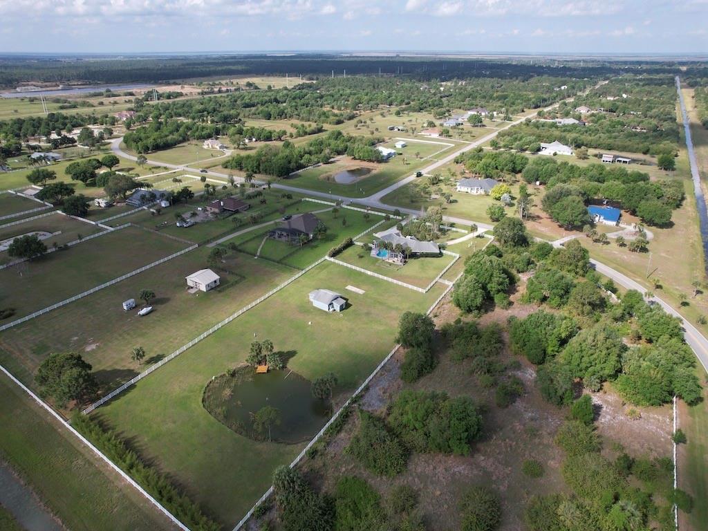 212 Deer Run Road Palm Bay, FL 32909 - Photo 10 of 15 an aerial view of a residential houses with outdoor space and street view
