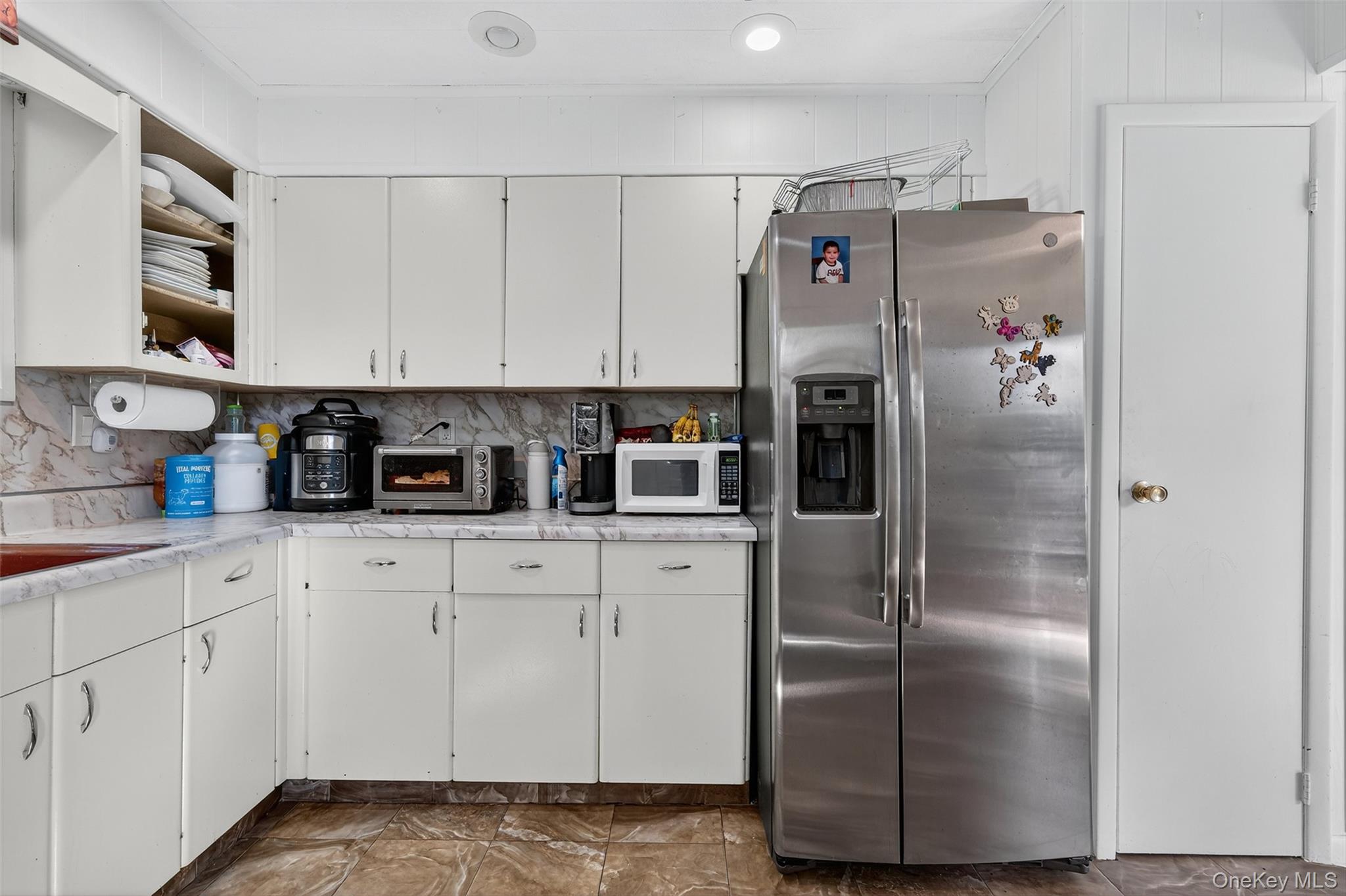 75 Pebble Path Rock Hill, NY 12775 - Photo 17 of 39 a kitchen with stainless steel appliances granite countertop a refrigerator and a stove