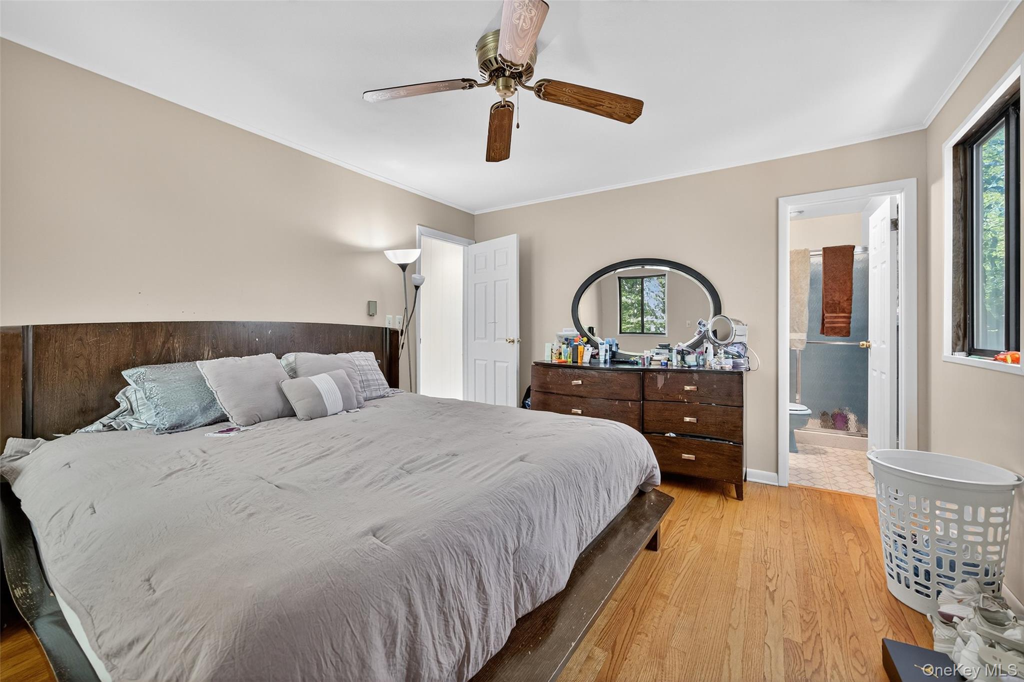 75 Pebble Path Rock Hill, NY 12775 - Photo 19 of 39 a bedroom with a bed and a chandelier