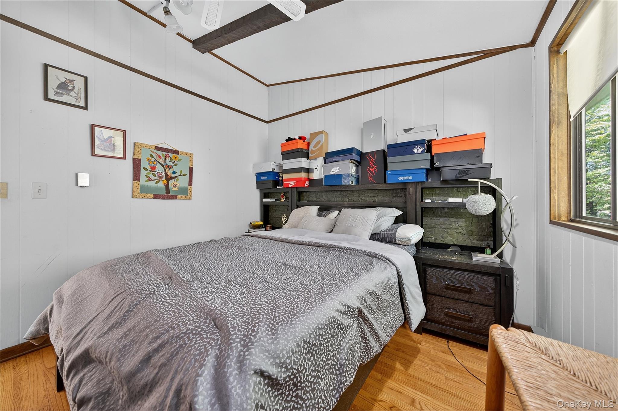 75 Pebble Path Rock Hill, NY 12775 - Photo 22 of 39 a bedroom with a bed and a window