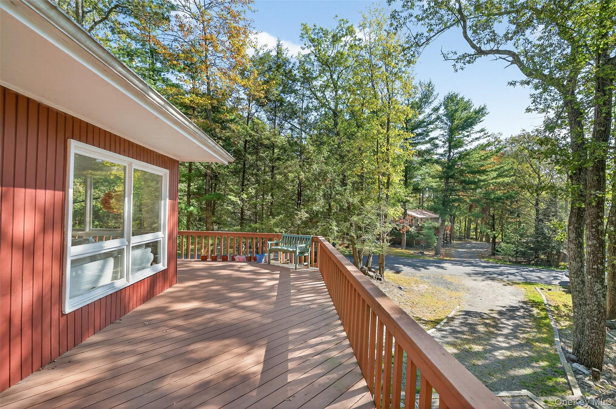 75 Pebble Path Rock Hill, NY 12775 - Photo 26 of 39 a balcony with view of trees in front of it