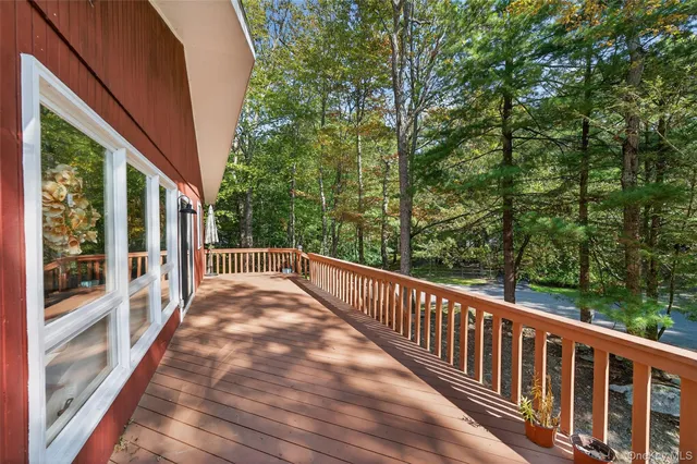 an outdoor view of a house with a porch