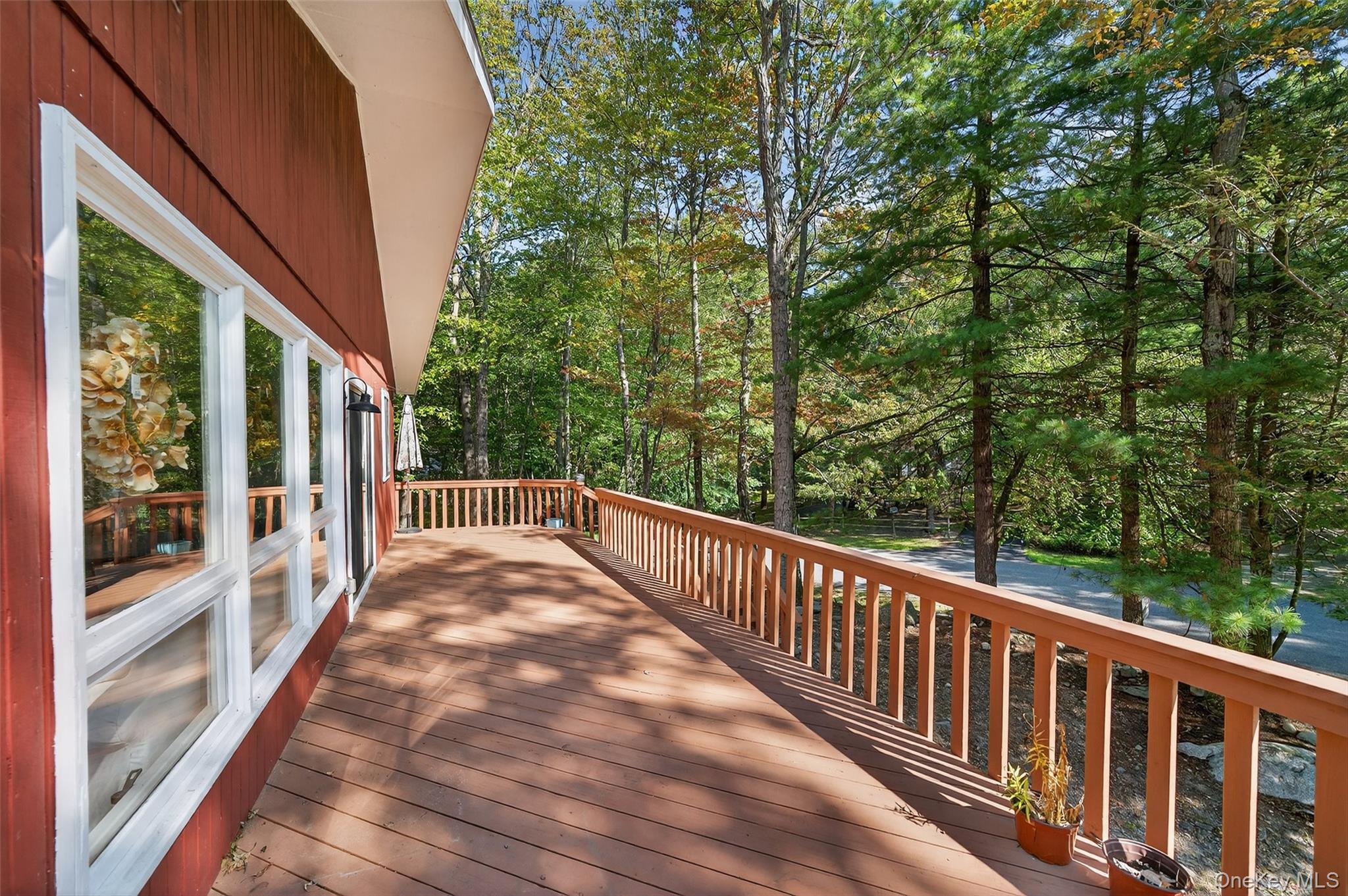 75 Pebble Path Rock Hill, NY 12775 - Photo 27 of 39 a view of balcony with wooden floor and fence