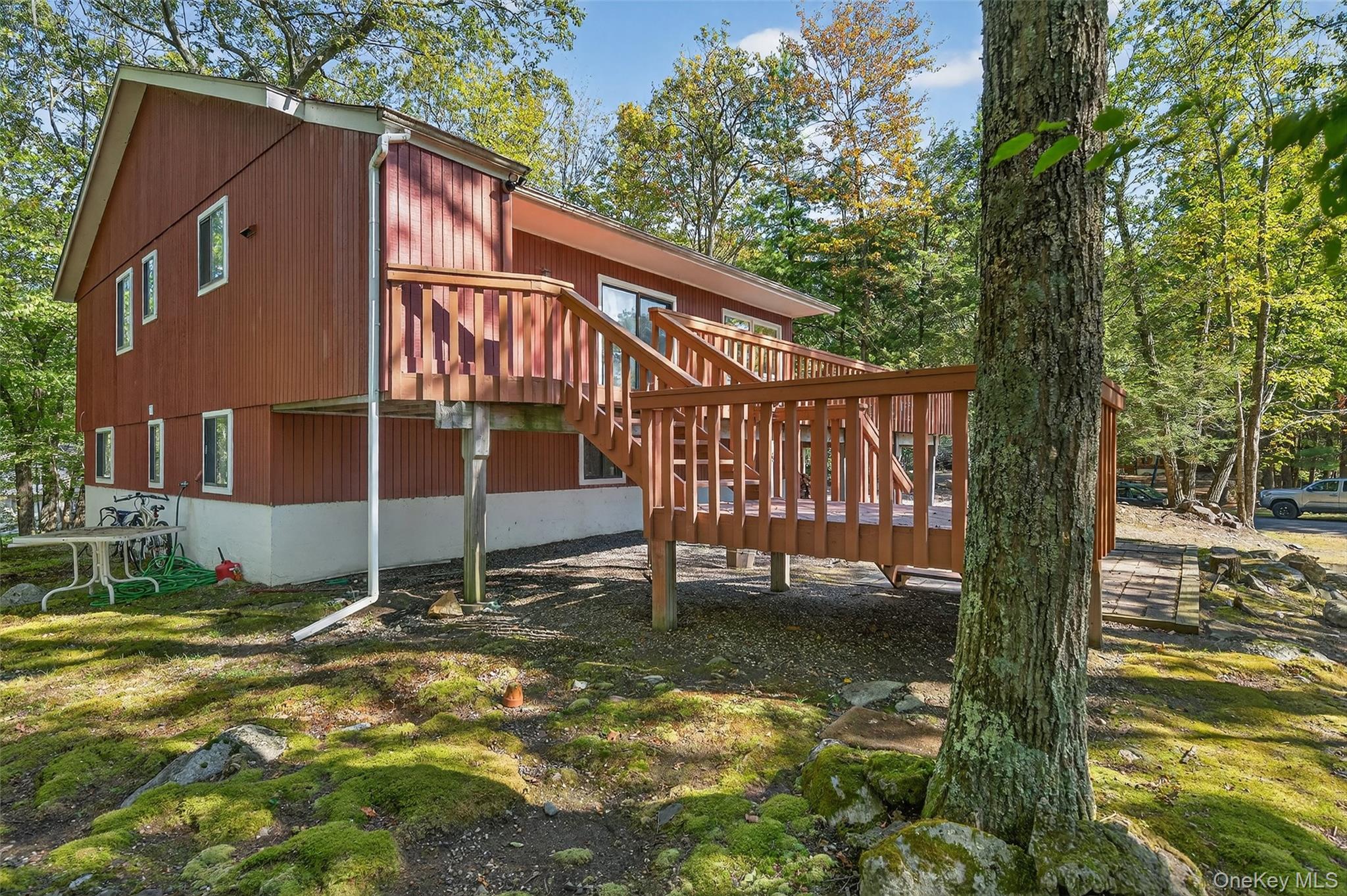 75 Pebble Path Rock Hill, NY 12775 - Photo 30 of 39 a view of a house with backyard and sitting area