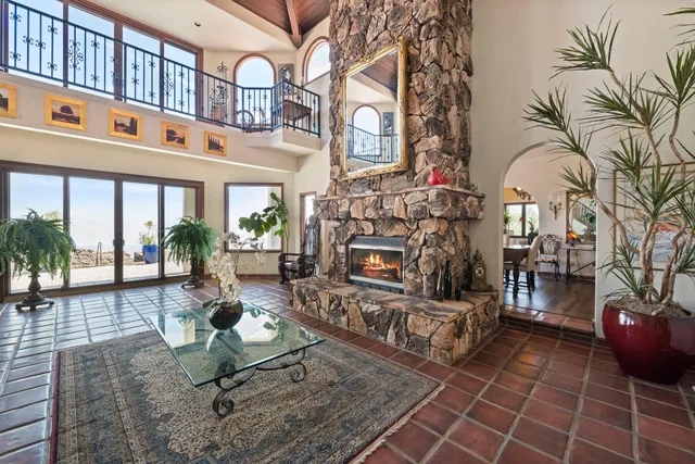 a view of a chairs and table in a patio