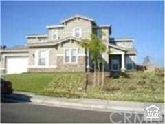 16153 Devor Circle Riverside, CA 92503 - Photo 1 of 1 a front view of a house
