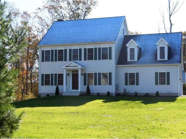 2 Evergreen Road Higganum, CT 06441 - Photo 1 of 1 a front view of a house with yard and green space