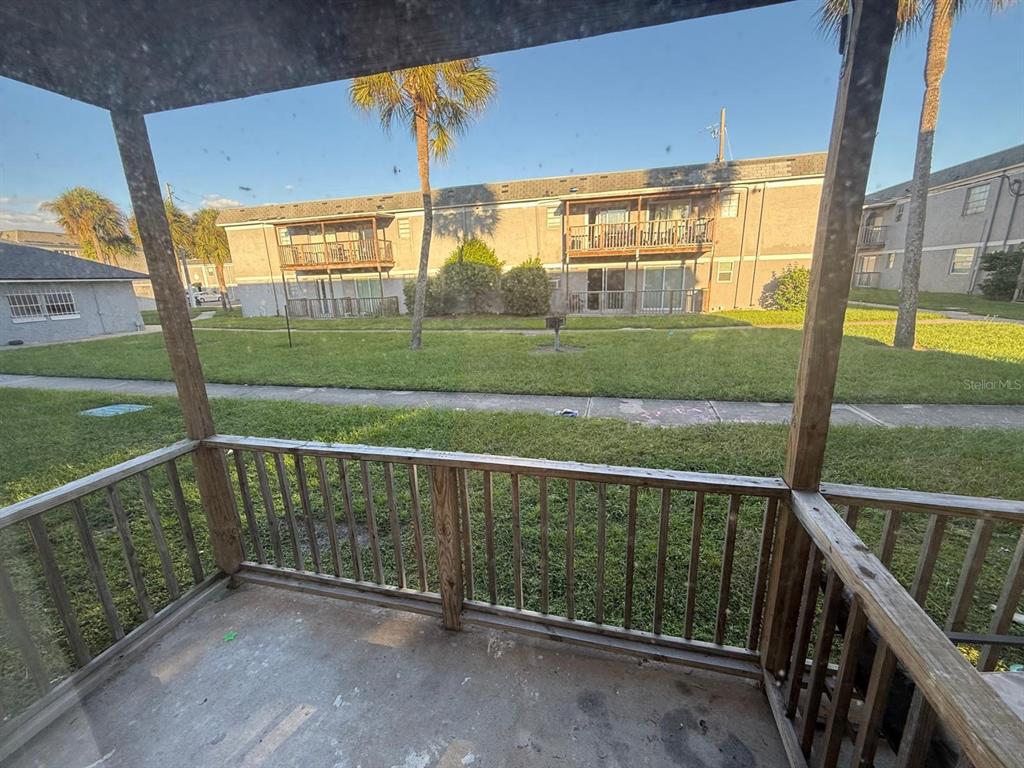 2787 L B McLeod Road, Unit 2787A Orlando, FL 32805 - Photo 11 of 34 a view of a porch and a yard