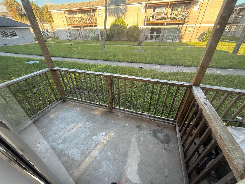 2787 L B McLeod Road, Unit 2787A Orlando, FL 32805 - Photo 22 of 34 a view of balcony with yard