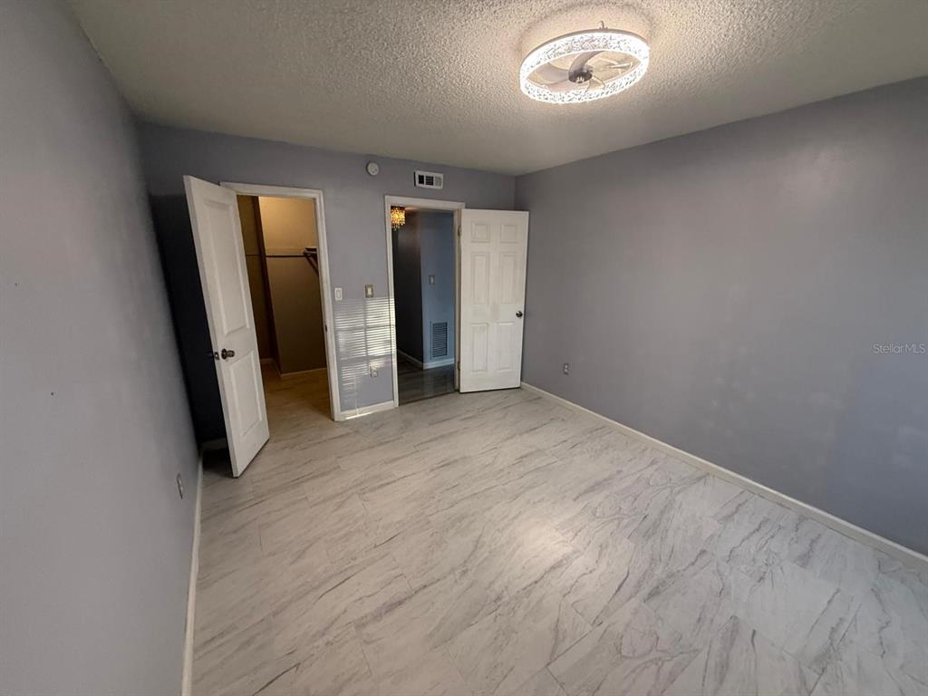 2787 L B McLeod Road, Unit 2787A Orlando, FL 32805 - Photo 27 of 34 an empty room with window