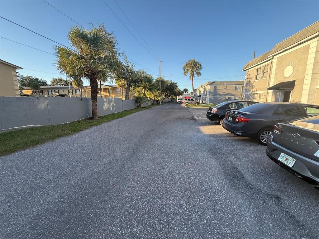 2787 L B McLeod Road, Unit 2787A Orlando, FL 32805 - Photo 3 of 34 a view of street with parked cars
