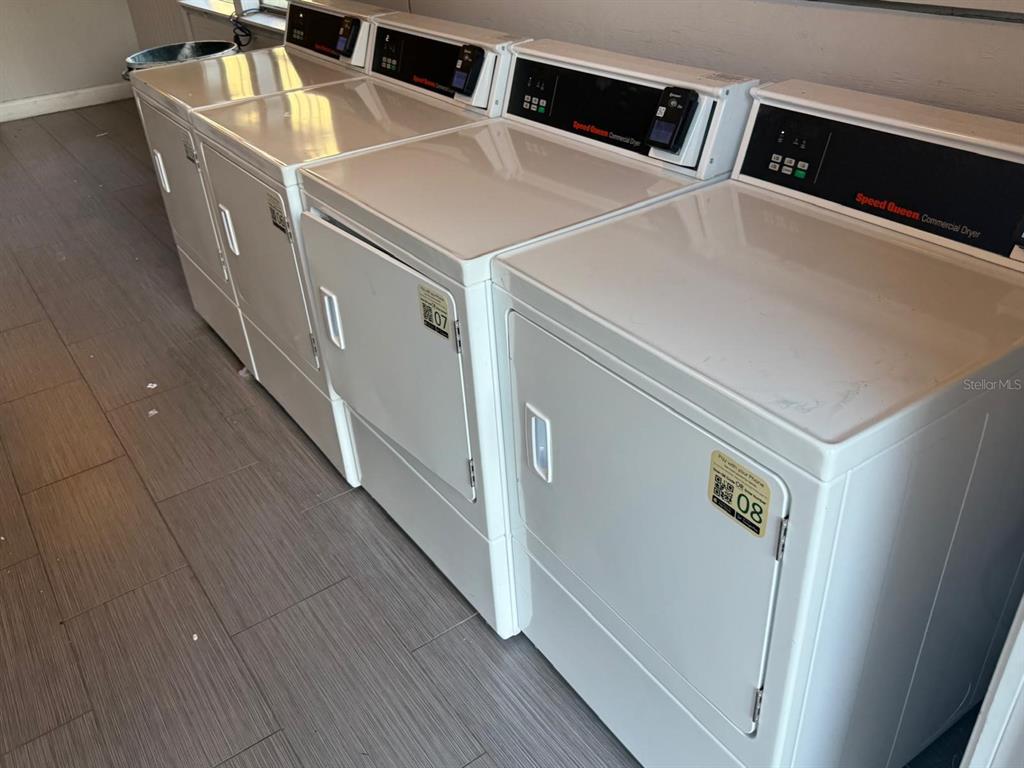2787 L B McLeod Road, Unit 2787A Orlando, FL 32805 - Photo 33 of 34 a utility room with dryer and washer