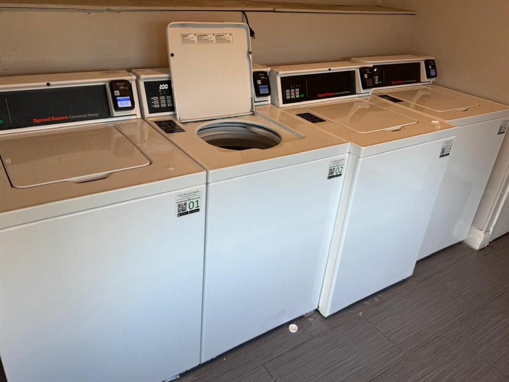 2787 L B McLeod Road, Unit 2787A Orlando, FL 32805 - Photo 34 of 34 a utility room with dryer and washer