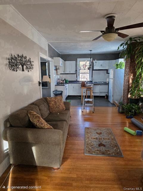 1003 Sacket Avenue Bronx, NY 10462 - Photo 24 of 28 a living room with furniture and a fireplace