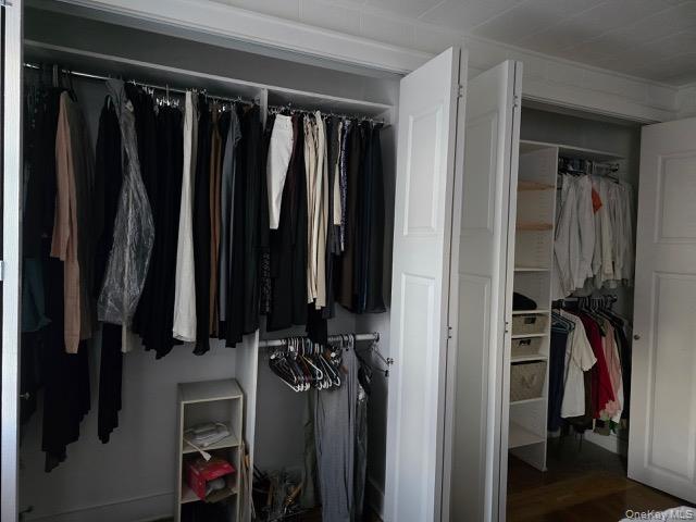 1003 Sacket Avenue Bronx, NY 10462 - Photo 26 of 28 a view of walk in closet with clothes and shoes