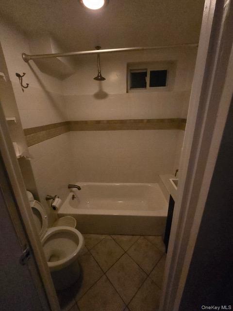 1003 Sacket Avenue Bronx, NY 10462 - Photo 28 of 28 a bathroom with a tub and a shower