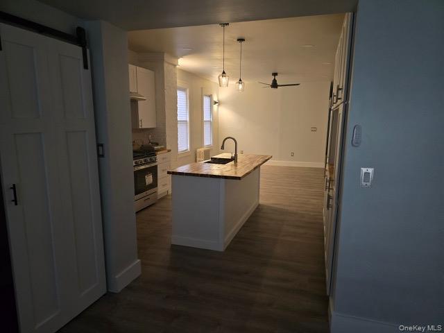 1003 Sacket Avenue Bronx, NY 10462 - Photo 5 of 28 a bathroom with granite countertop a sink and a mirror