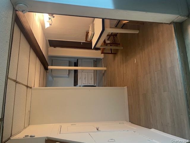 1003 Sacket Avenue Bronx, NY 10462 - Photo 8 of 28 a room with wooden floor and furniture