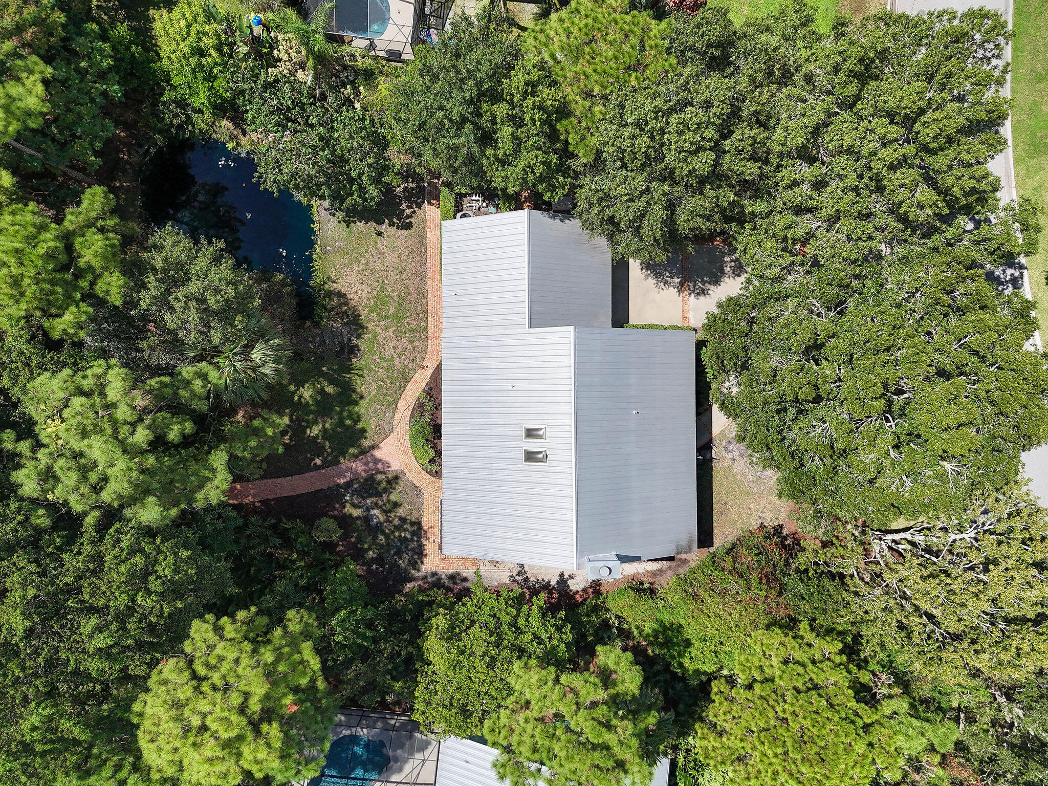556 Meadow Wood Way Stuart, FL 34997 - Photo 52 of 57 556MeadowWoodWayAerials(17)