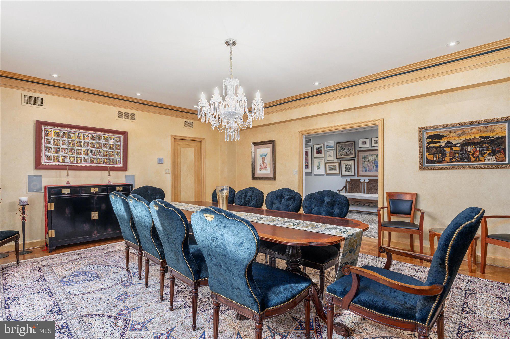 2101 Connecticut Avenue Northwest, Unit 78 Washington, DC 20009 - Photo 15 of 53 a view of a dining room with furniture and chandelier