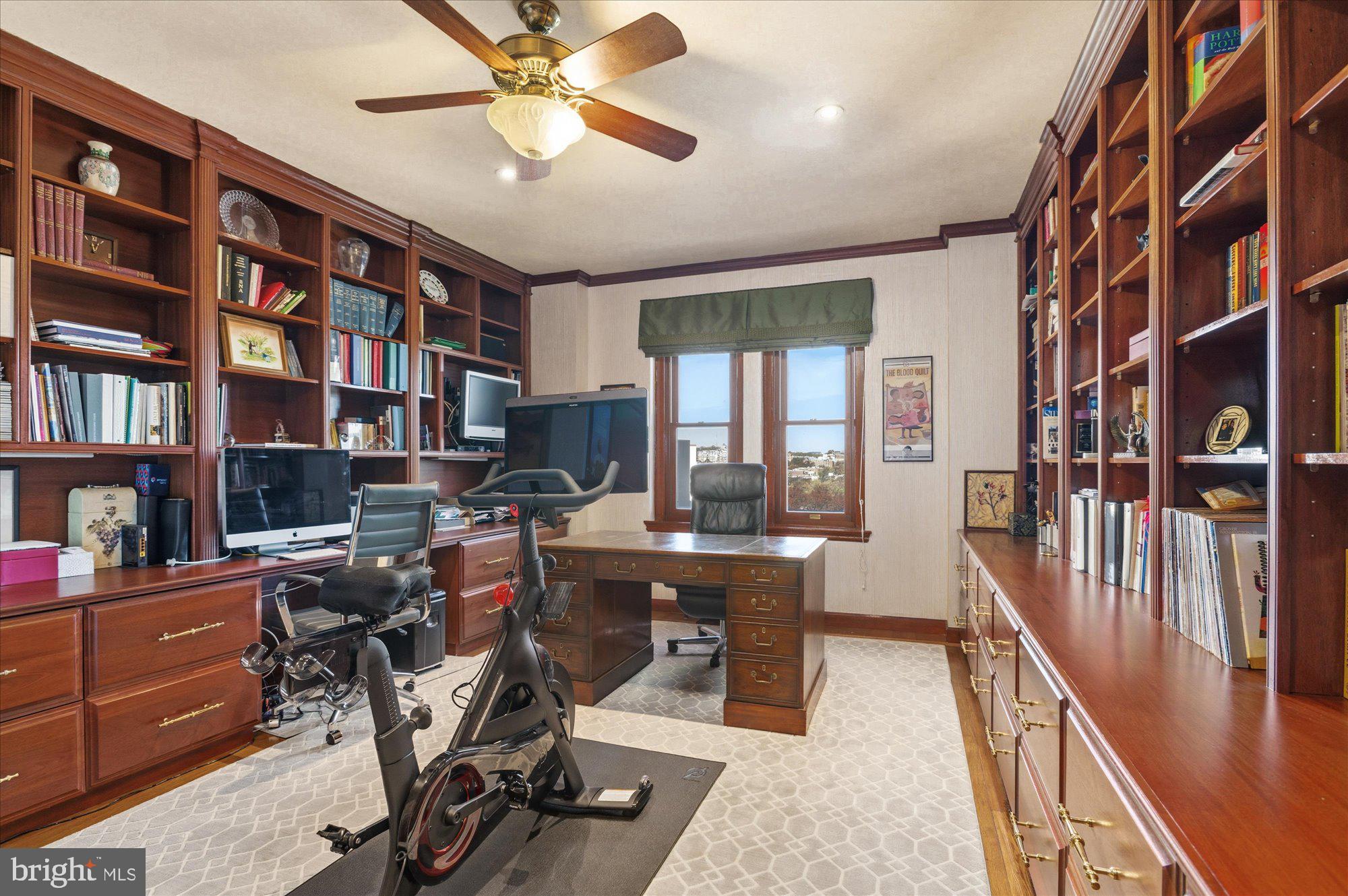 2101 Connecticut Avenue Northwest, Unit 78 Washington, DC 20009 - Photo 25 of 53 a view of a workspace with furniture and a book shelf